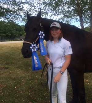 Linda and Will with blue ribbon